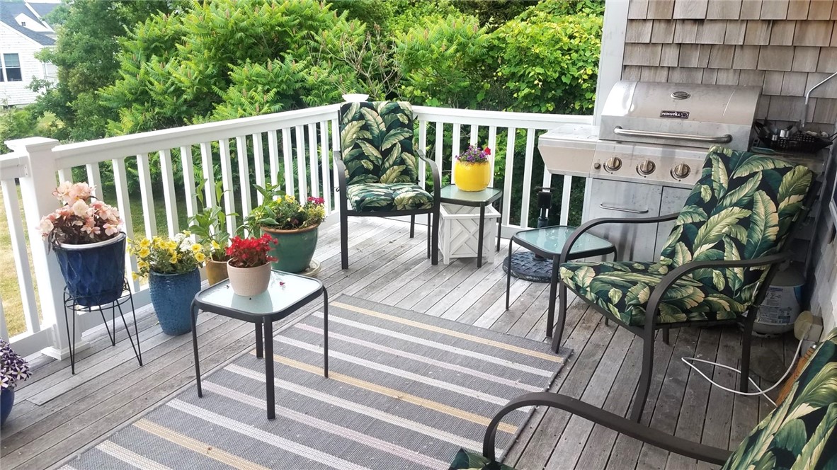 27 Sanderling Way Middletown, RI 02842 - Photo 13 of 13 Deck with Awning off Living area