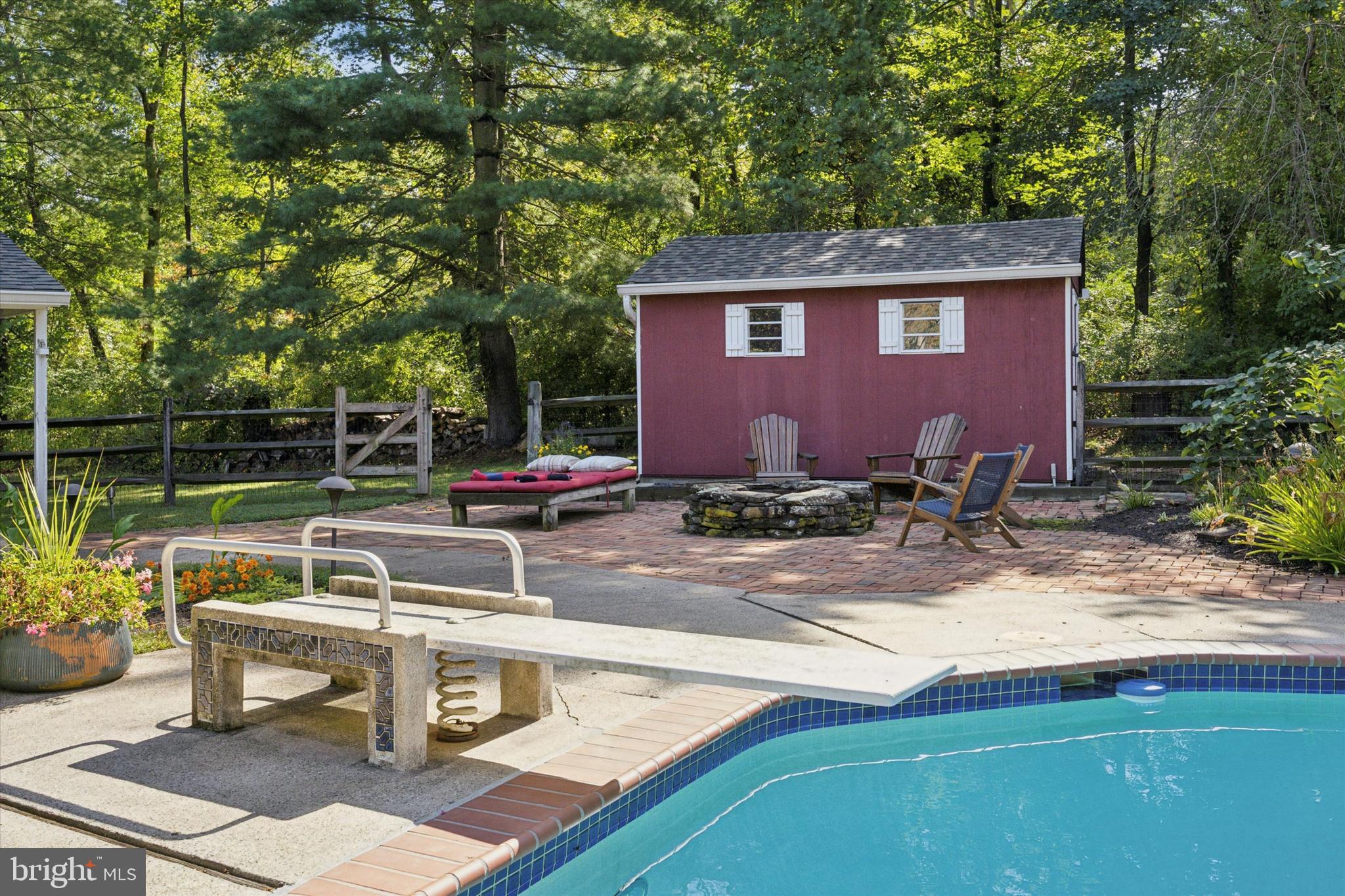 4104 Tinker Hill Road Phoenixville, PA 19460 - Photo 11 of 63 a view of backyard with outdoor seating