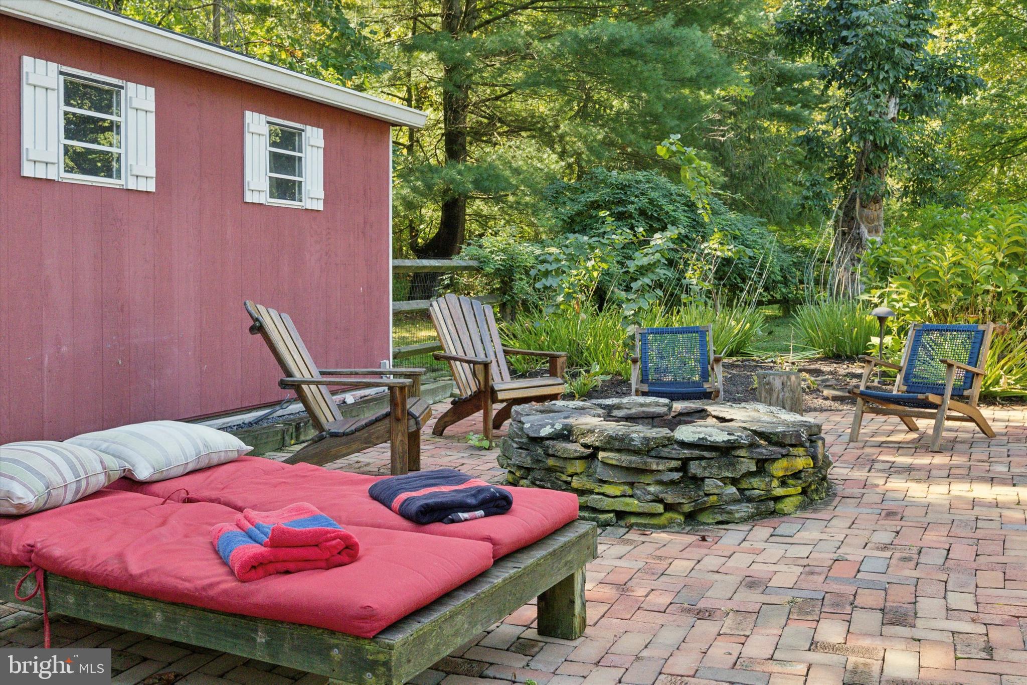 4104 Tinker Hill Road Phoenixville, PA 19460 - Photo 12 of 63 a view of backyard with outdoor seating