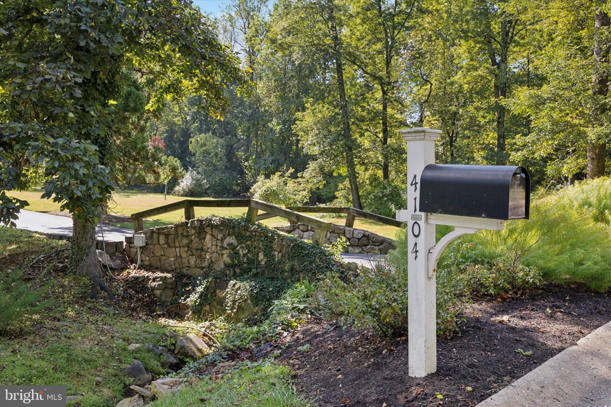 4104 Tinker Hill Road Phoenixville, PA 19460 - Photo 16 of 63 a backyard of a house with lots of green space