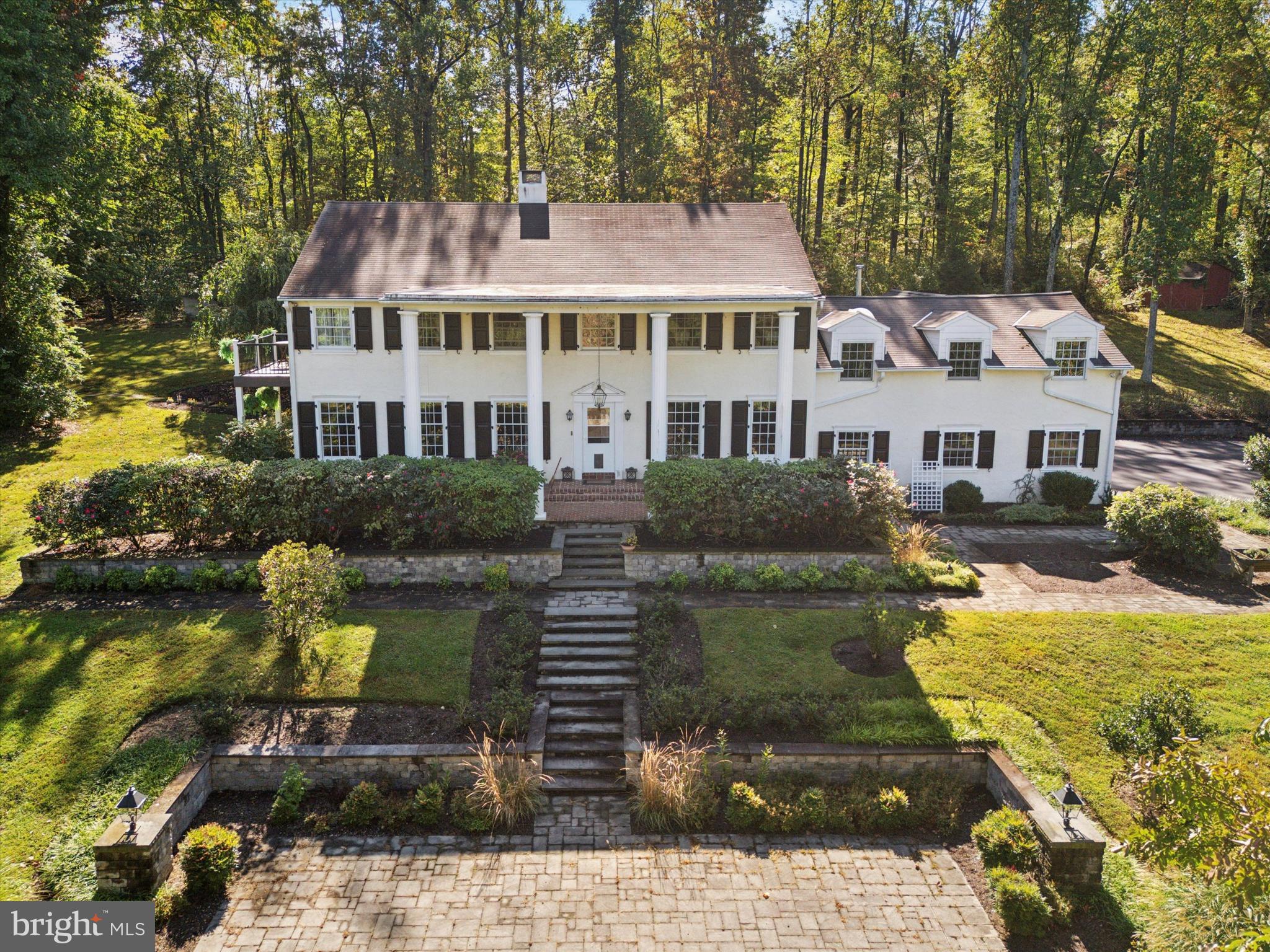4104 Tinker Hill Road Phoenixville, PA 19460 - Photo 2 of 63 a aerial view of a house with swimming pool and sitting area