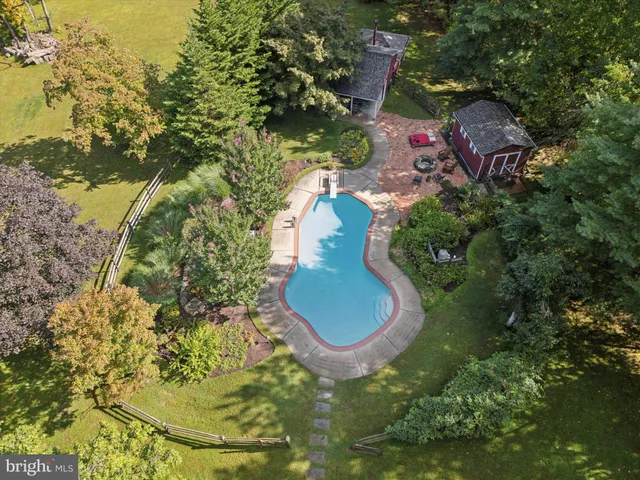 a kitchen with stainless steel appliances a sink and a large window