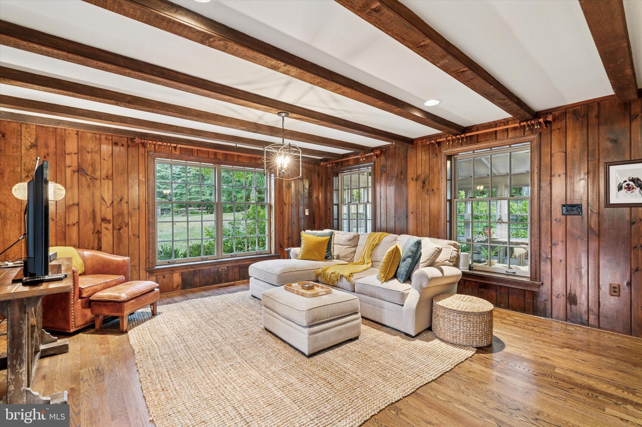 4104 Tinker Hill Road Phoenixville, PA 19460 - Photo 36 of 63 a living room with furniture and a large window