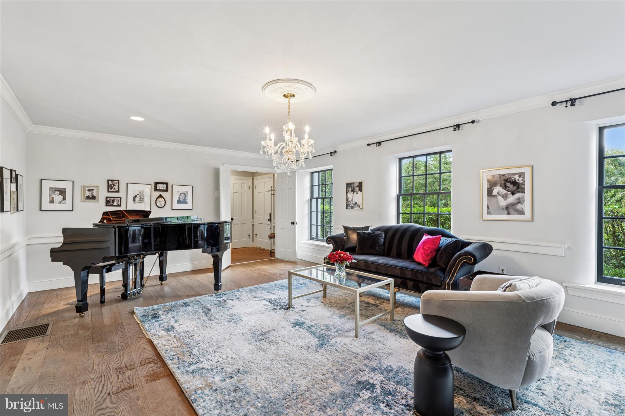 4104 Tinker Hill Road Phoenixville, PA 19460 - Photo 38 of 63 a living room with furniture and a chandelier