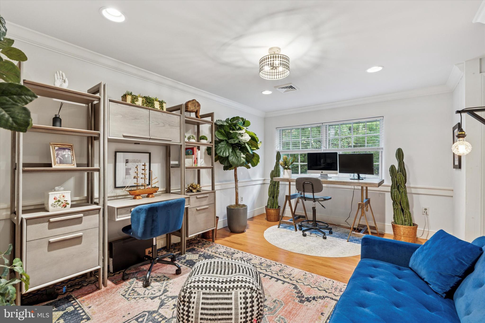 4104 Tinker Hill Road Phoenixville, PA 19460 - Photo 47 of 63 a view of a livingroom with furniture a flat screen tv and a large window