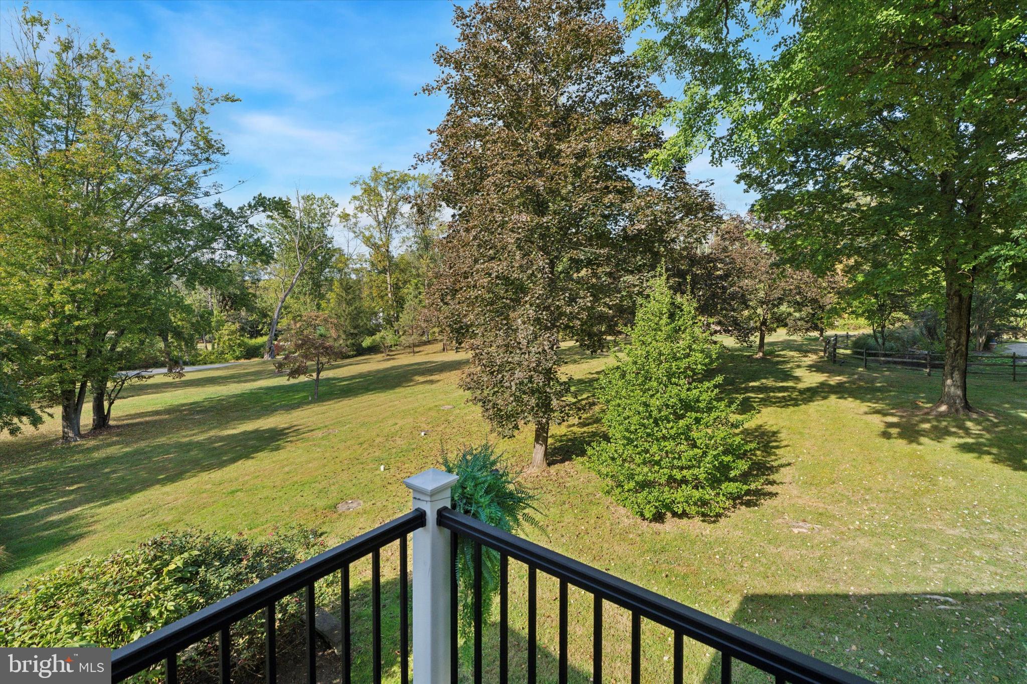 4104 Tinker Hill Road Phoenixville, PA 19460 - Photo 56 of 63 a view of a lake from a balcony