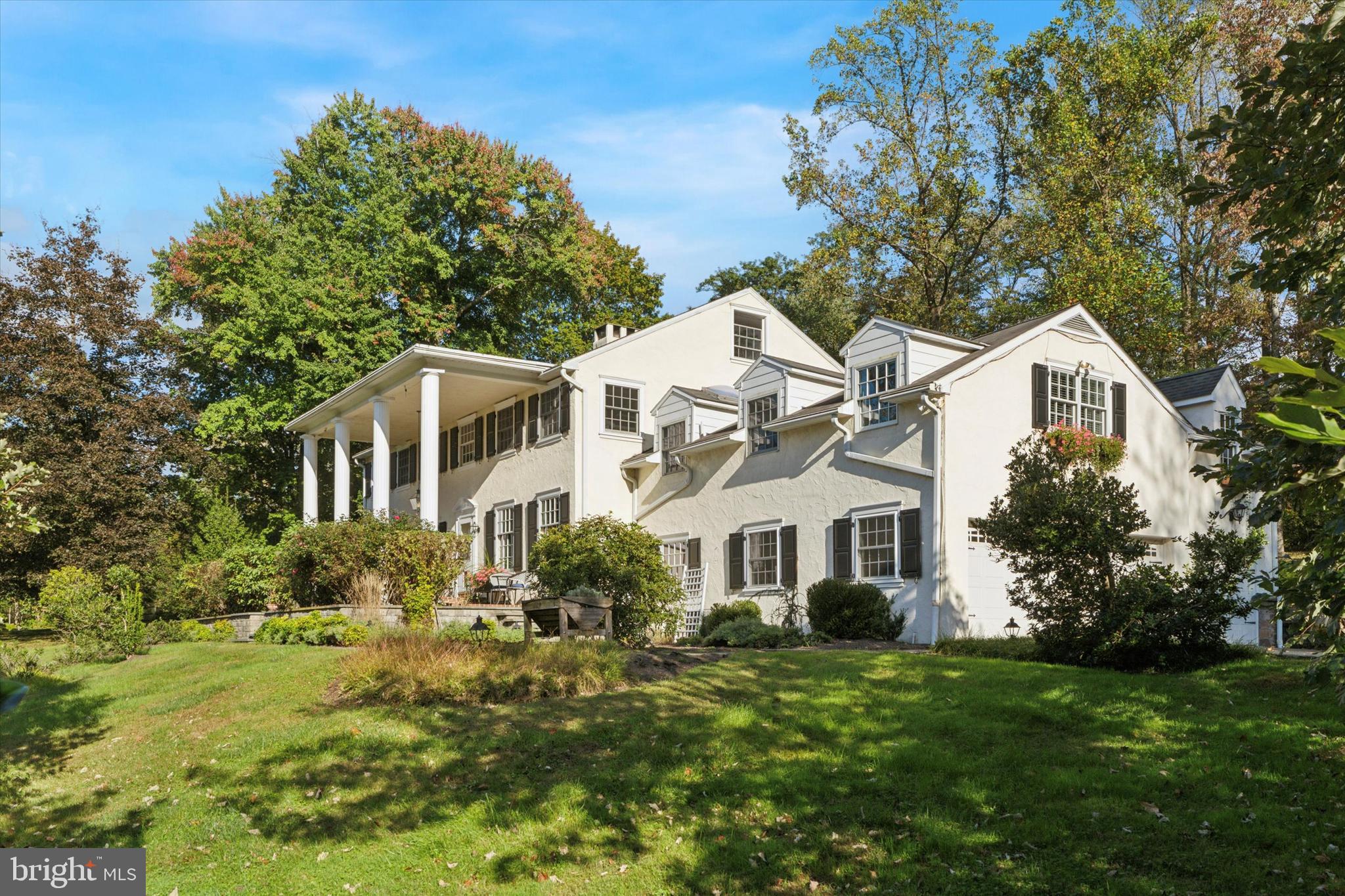 4104 Tinker Hill Road Phoenixville, PA 19460 - Photo 59 of 63 a front view of a house with a garden
