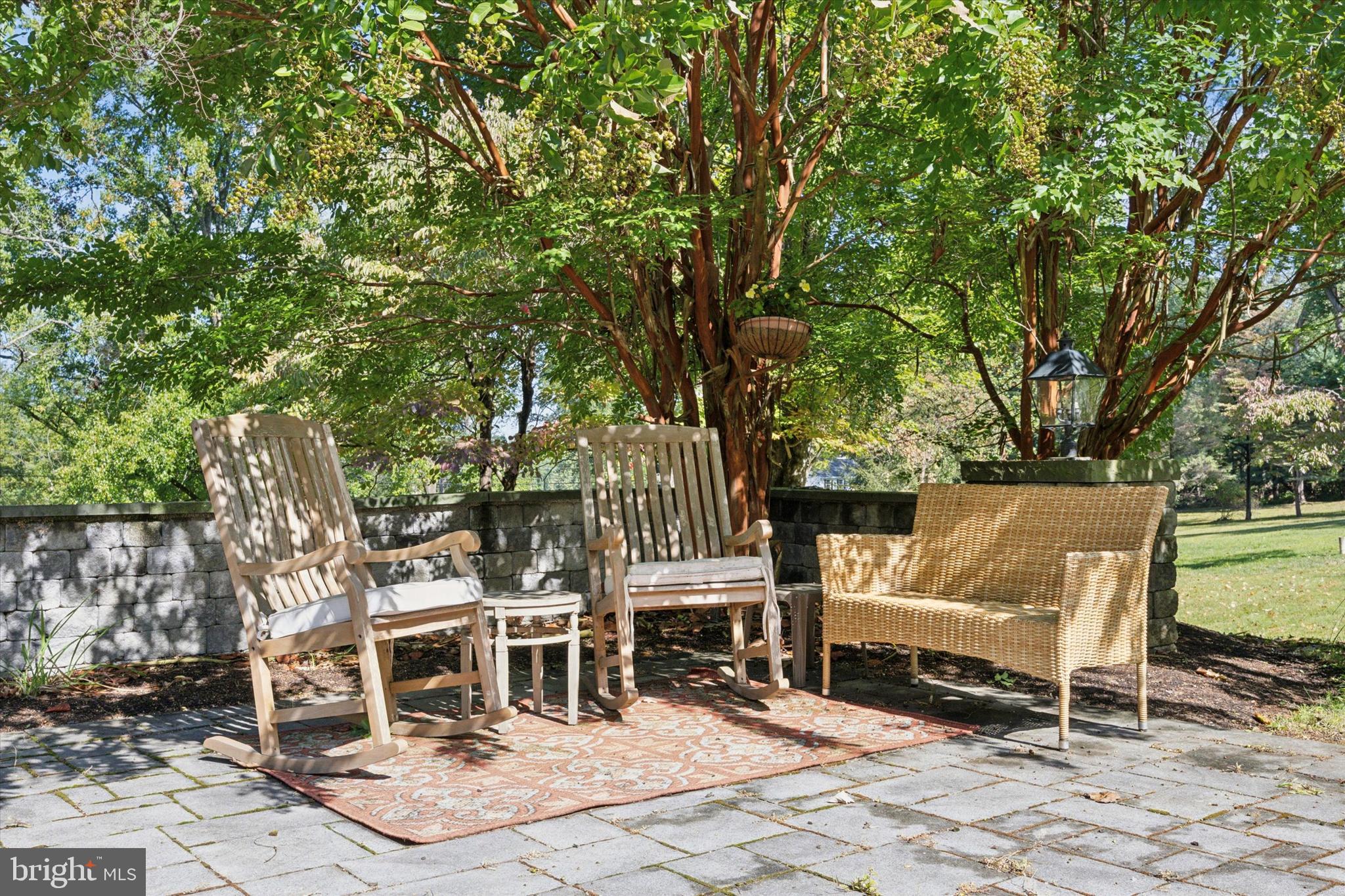 4104 Tinker Hill Road Phoenixville, PA 19460 - Photo 6 of 63 a view of a chairs and table in the back yard of the house