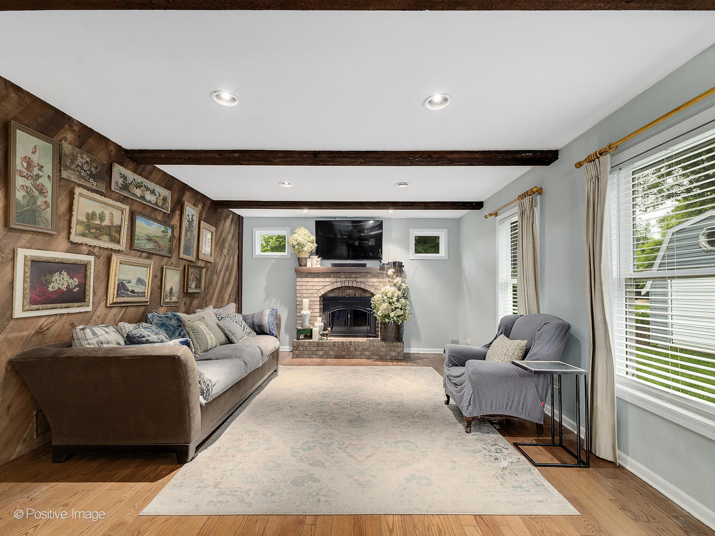 N412 Indian Knoll Road West Chicago, IL 60185 - Photo 14 of 25 a living room with furniture and a fireplace