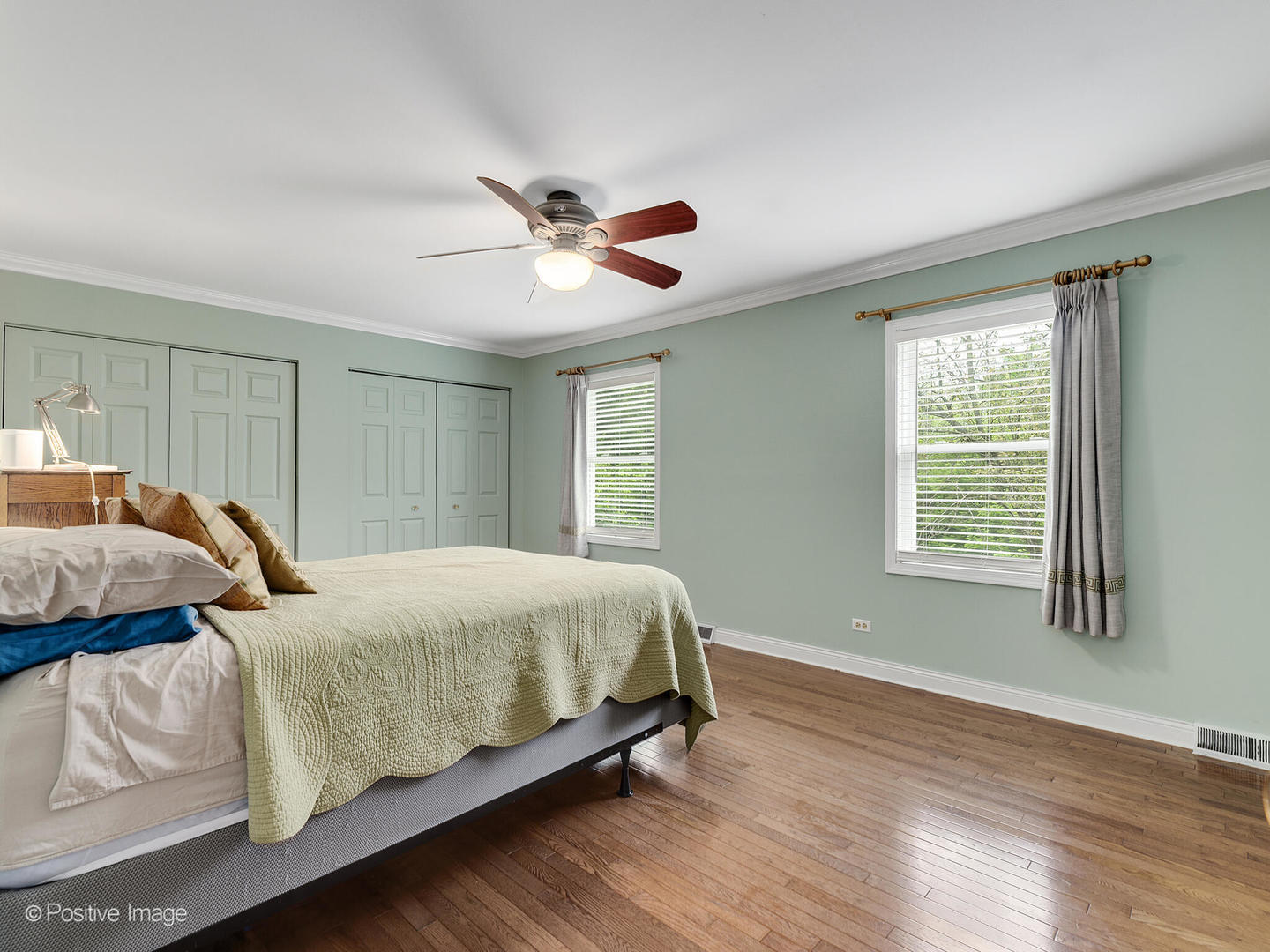 N412 Indian Knoll Road West Chicago, IL 60185 - Photo 17 of 25 a bedroom with two beds and a window