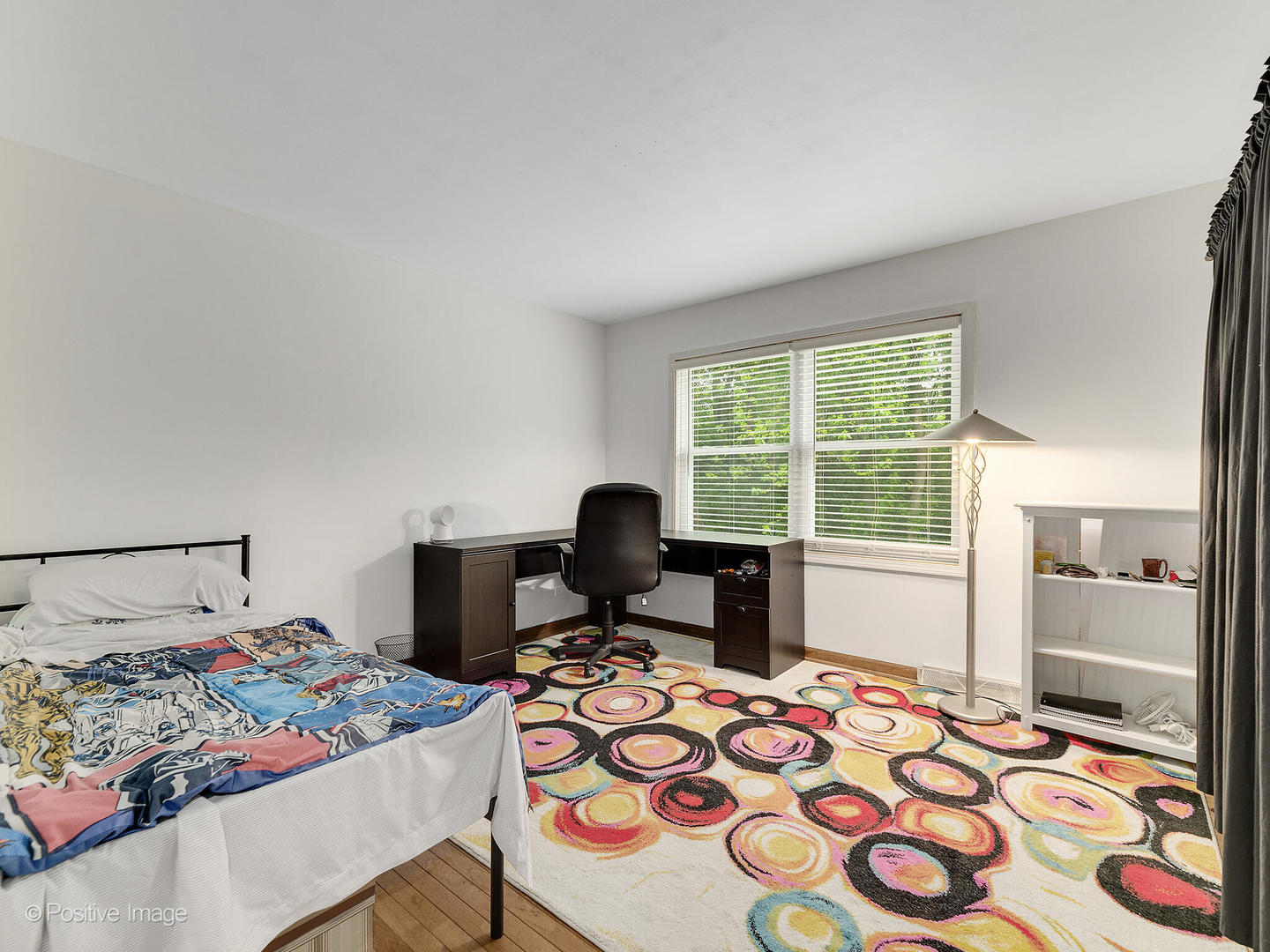N412 Indian Knoll Road West Chicago, IL 60185 - Photo 19 of 25 a bedroom with a bed and a window