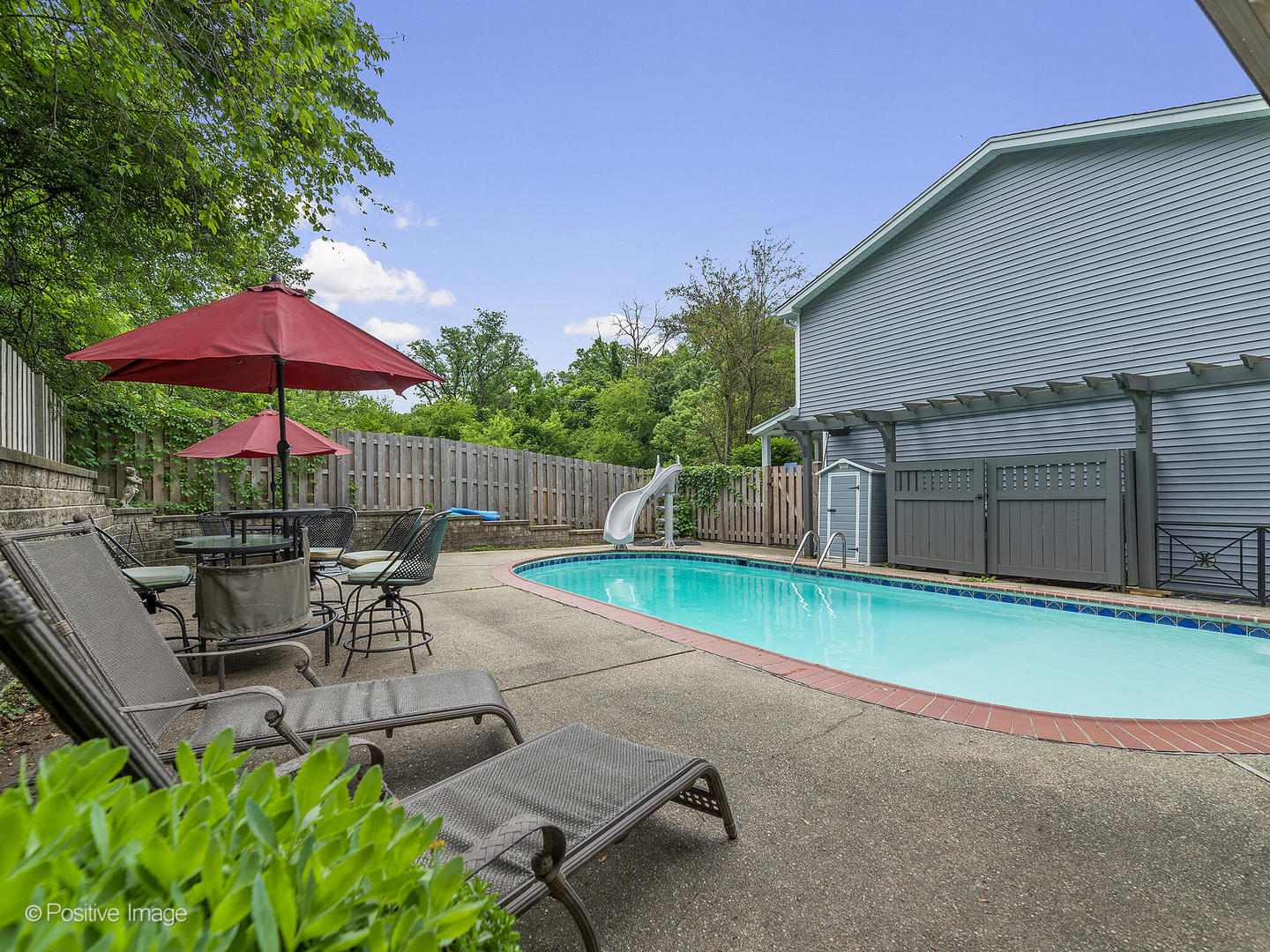 N412 Indian Knoll Road West Chicago, IL 60185 - Photo 2 of 25 a view of backyard with outdoor seating and plants