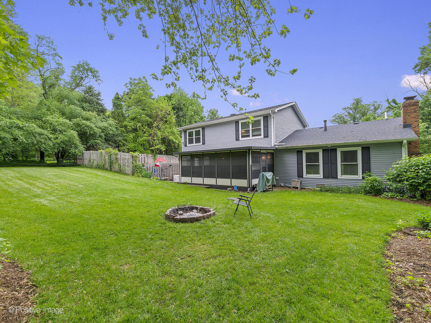 N412 Indian Knoll Road West Chicago, IL 60185 - Photo 24 of 25 a front view of a house with garden