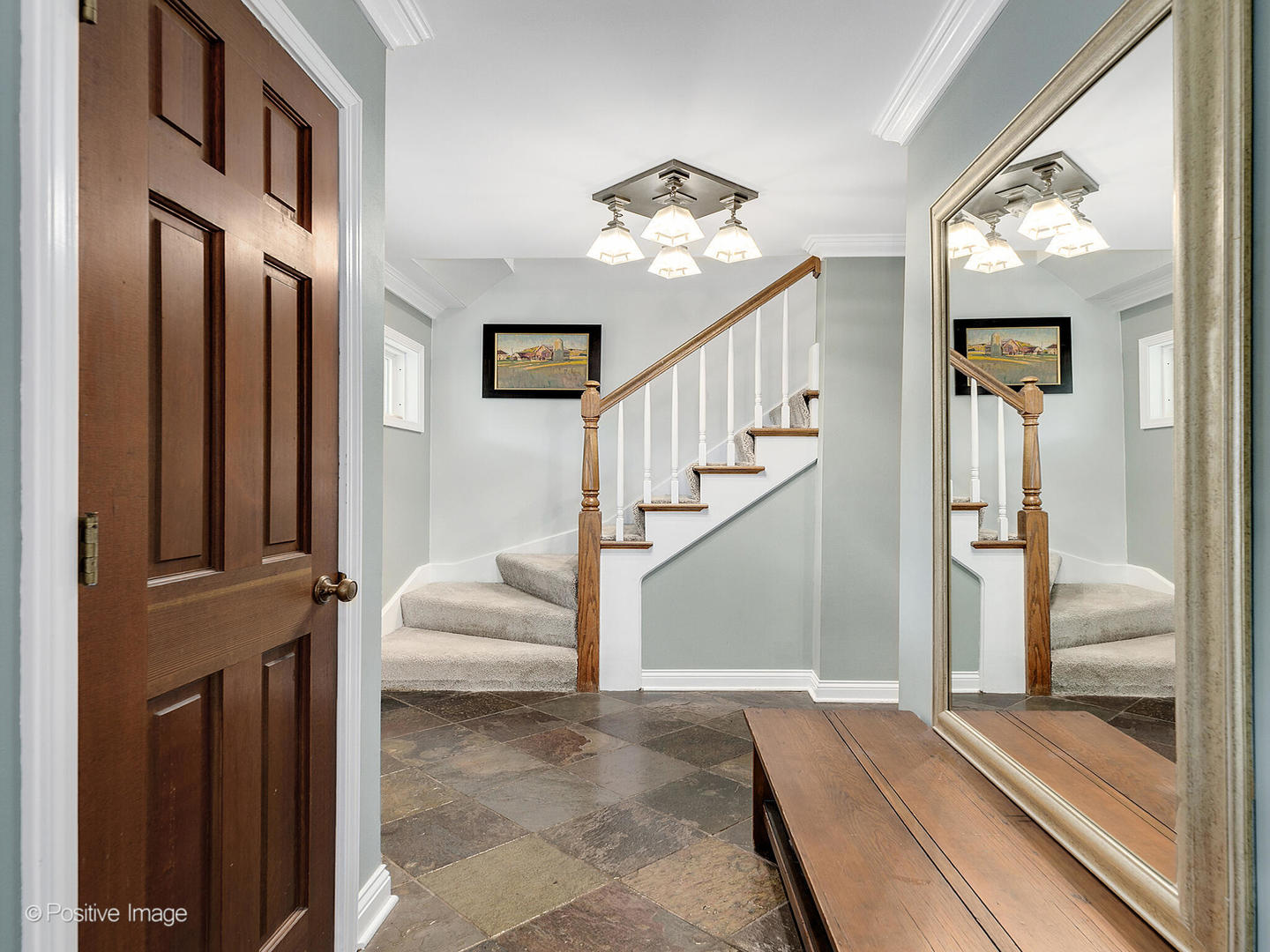 N412 Indian Knoll Road West Chicago, IL 60185 - Photo 25 of 25 a view of staircase with white walls and chandelier