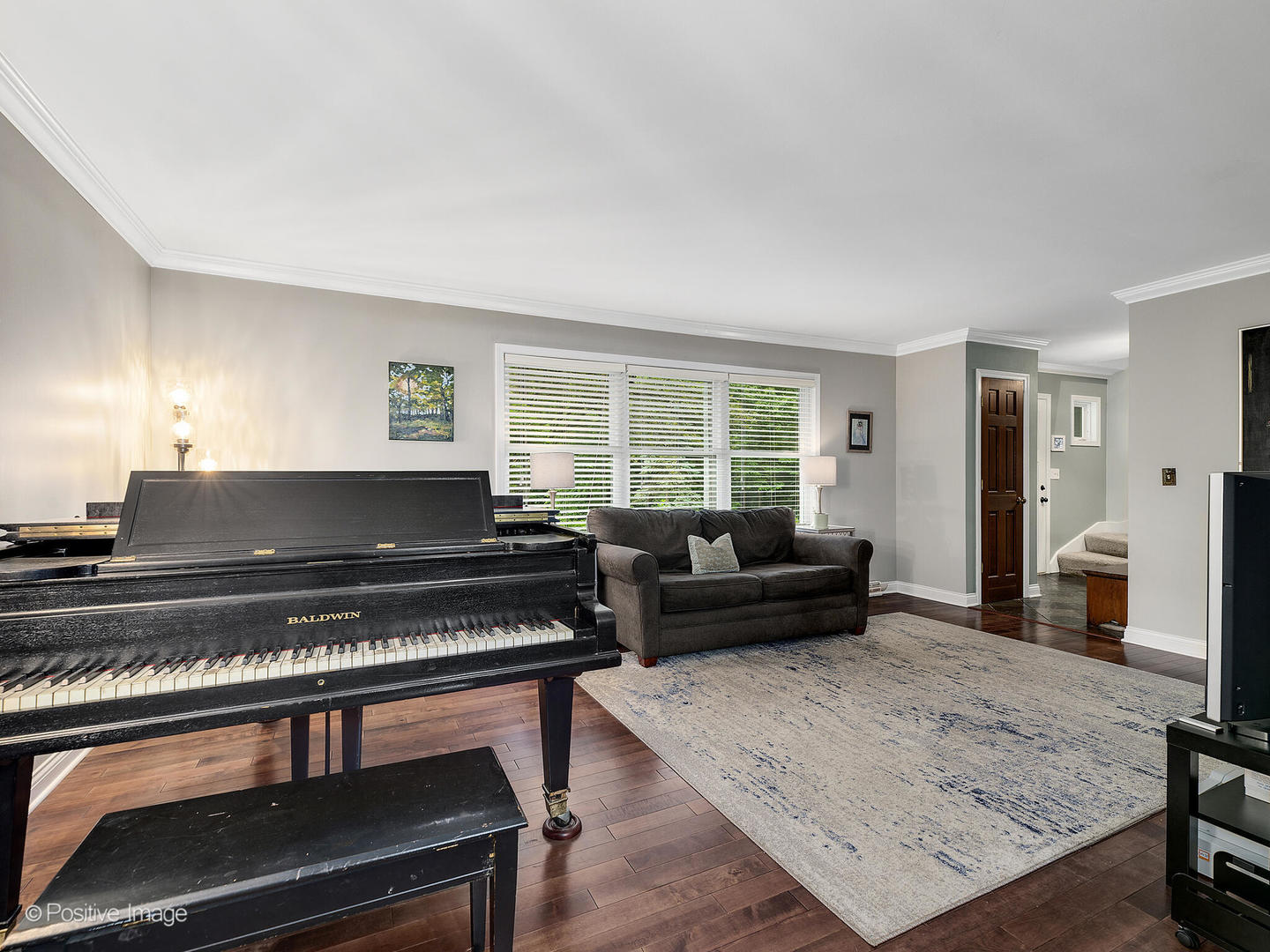 N412 Indian Knoll Road West Chicago, IL 60185 - Photo 5 of 25 a living room with furniture and a fireplace