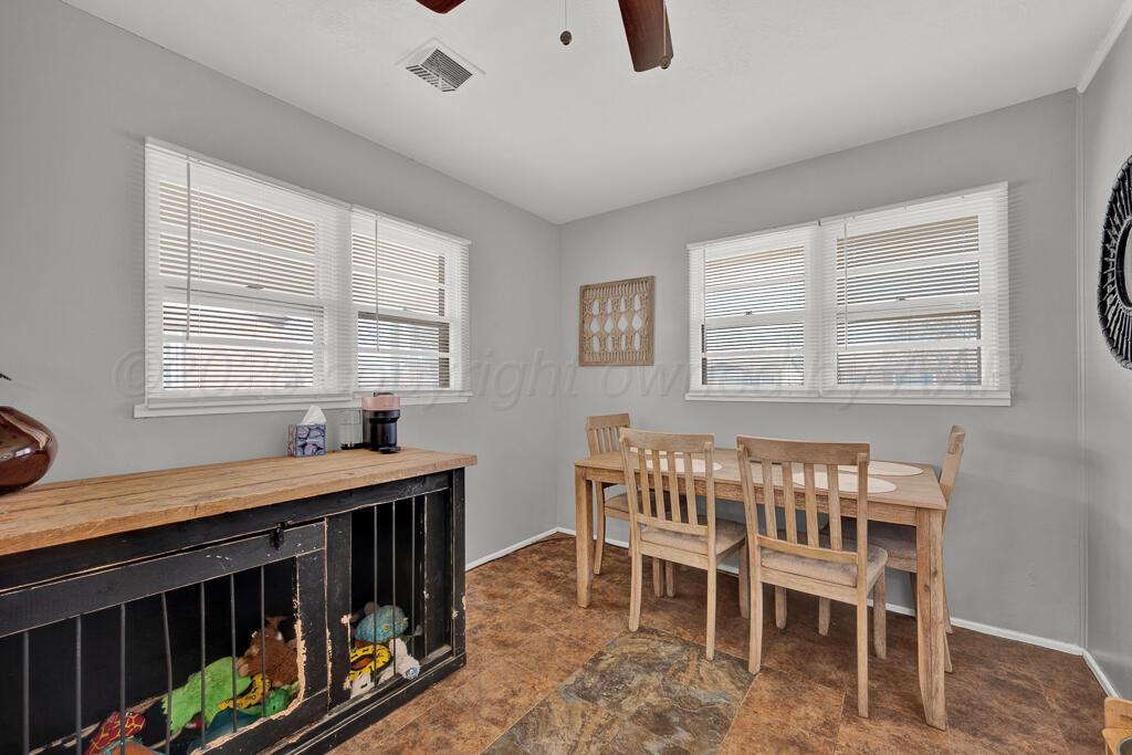 5016 Leigh Avenue Amarillo, TX 79110 - Photo 12 of 21 a dining room with furniture and window