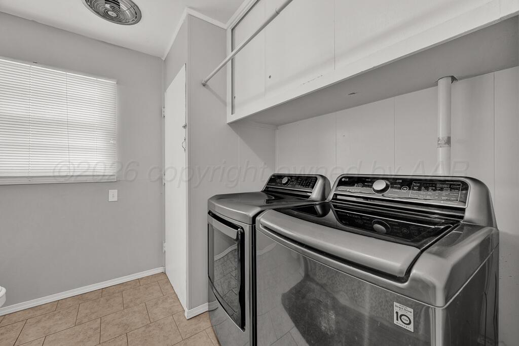 5016 Leigh Avenue Amarillo, TX 79110 - Photo 16 of 21 a view of kitchen and wooden floor