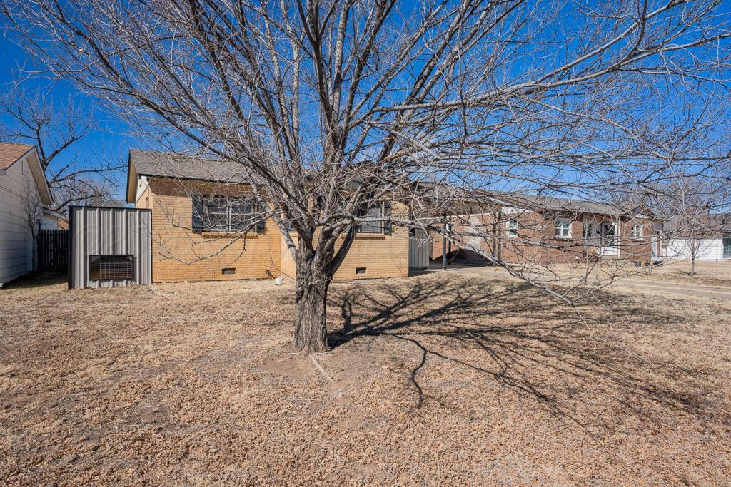 5016 Leigh Avenue Amarillo, TX 79110 - Photo 3 of 21 a view of a yard with a house