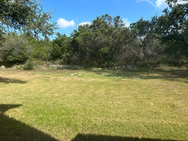 a view of a swimming pool with an outdoor space and seating area