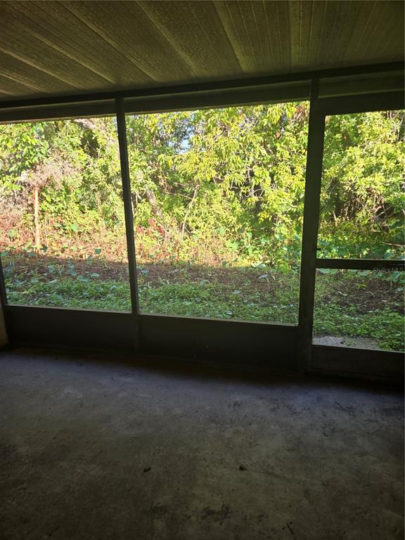 1313 54th Avenue East, Unit 1313 Bradenton, FL 34203 - Photo 16 of 17 a view of outdoor space with deck