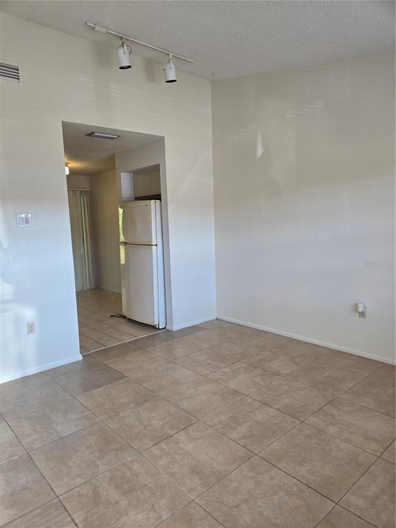 1313 54th Avenue East, Unit 1313 Bradenton, FL 34203 - Photo 4 of 17 a view of an empty room