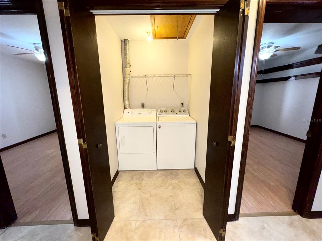 4300 Northeast 17th Terrace Gainesville, FL 32609 - Photo 10 of 21 a view of a bathroom with a sink and a mirror