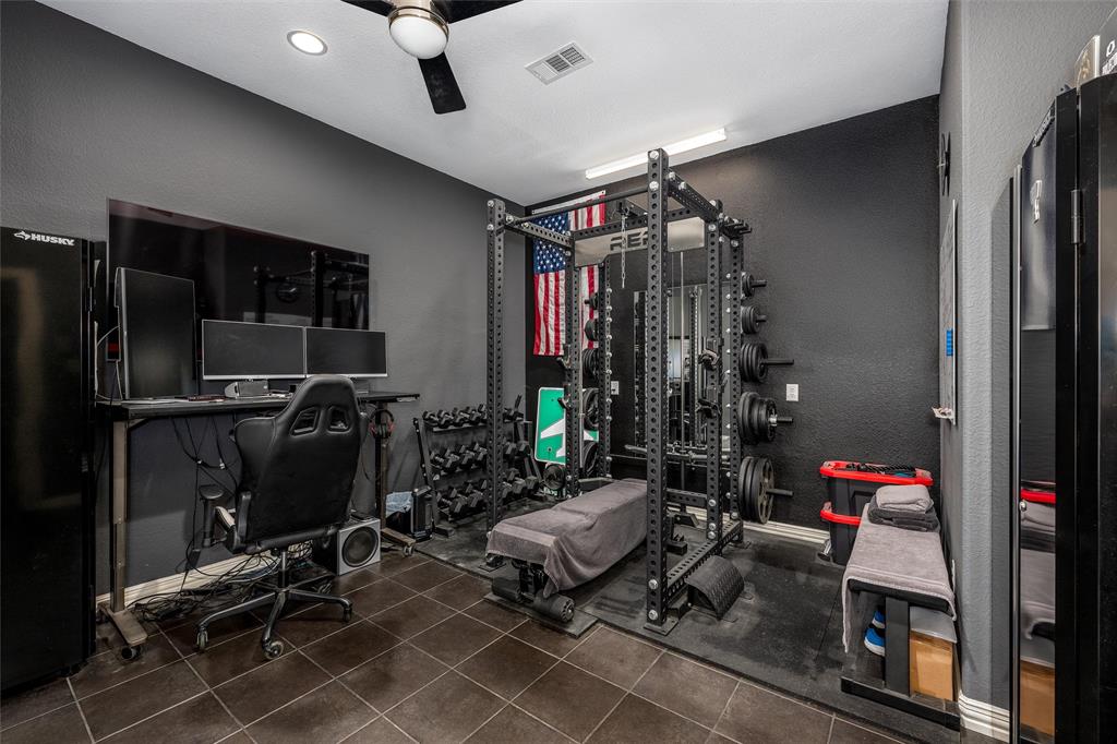 5033 Brook Lane Anna, TX 75409 - Photo 15 of 35 a living room with furniture a air conditioner vent and a window
