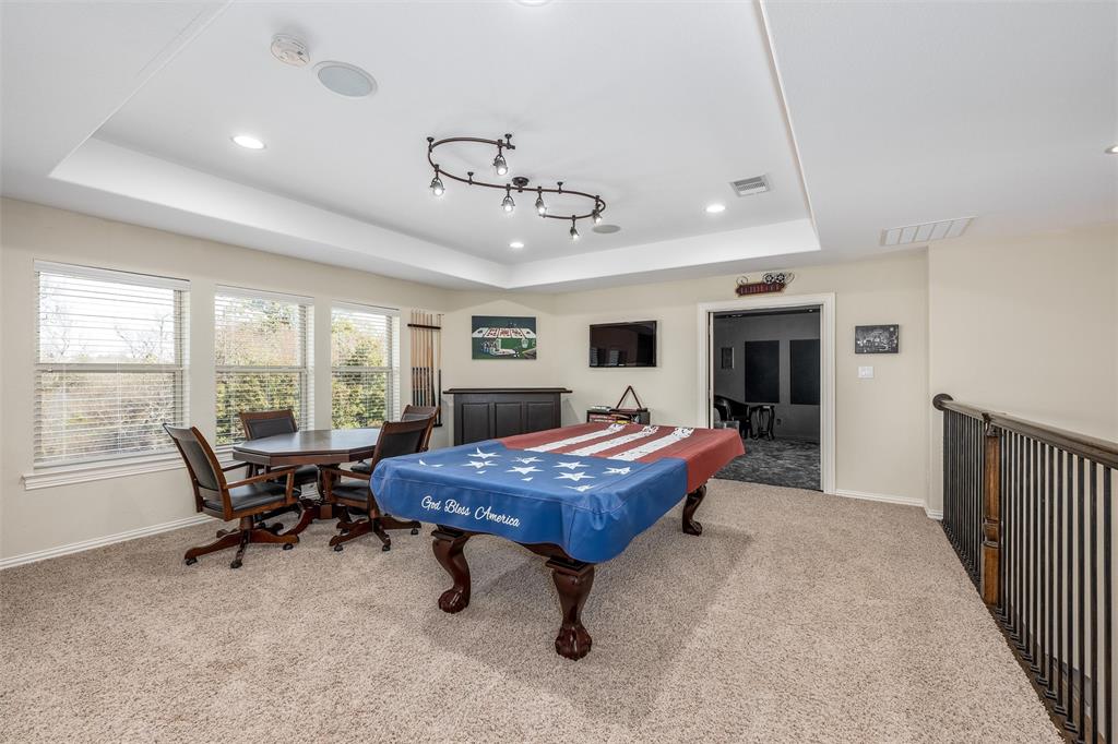 5033 Brook Lane Anna, TX 75409 - Photo 22 of 35 a living room with furniture a large window and a table