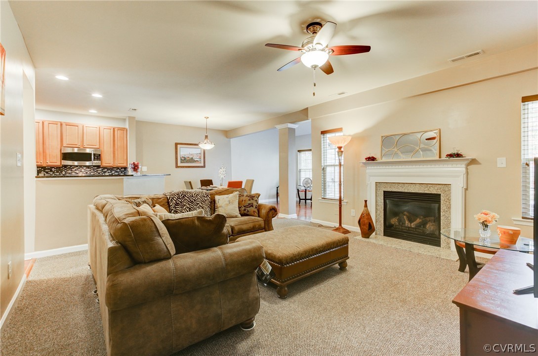 3602 Avocado Drive Midlothian, VA 23112 - Photo 16 of 39 a living room with furniture and a fireplace
