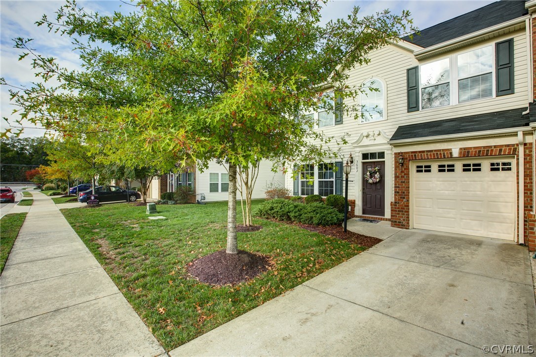 3602 Avocado Drive Midlothian, VA 23112 - Photo 2 of 39 a front view of a house with a yard and trees