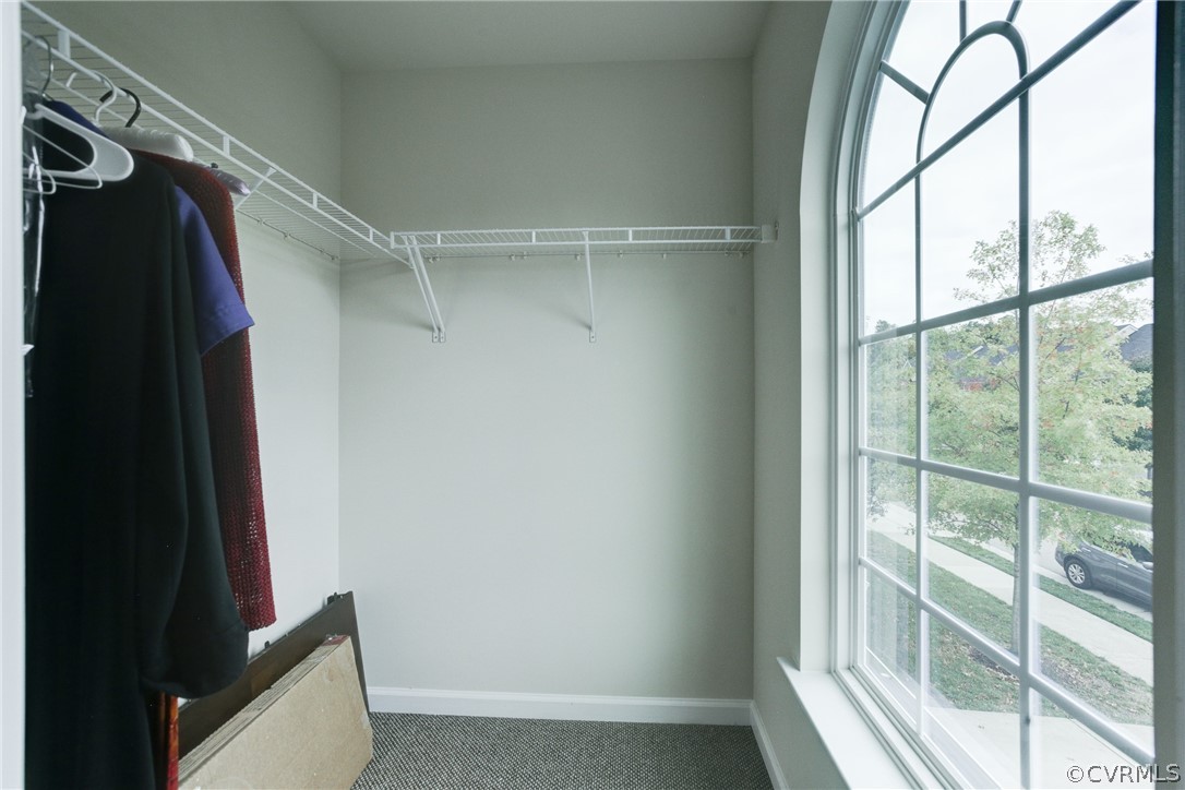 3602 Avocado Drive Midlothian, VA 23112 - Photo 22 of 39 a view of walk in closet with clothes and shoes