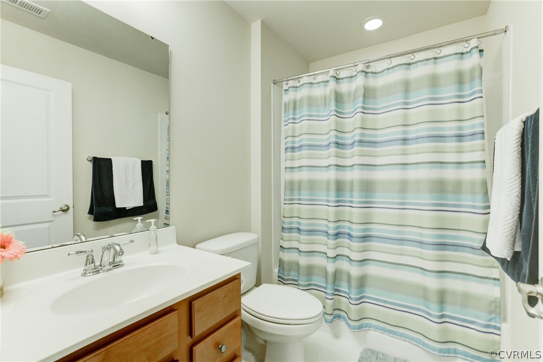3602 Avocado Drive Midlothian, VA 23112 - Photo 25 of 39 a bathroom with a sink toilet and shower