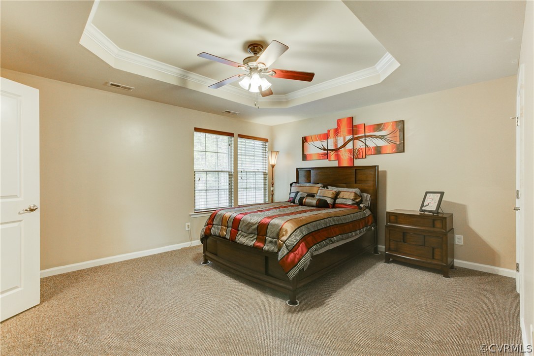 3602 Avocado Drive Midlothian, VA 23112 - Photo 28 of 39 a bed sitting in a bedroom next to a window