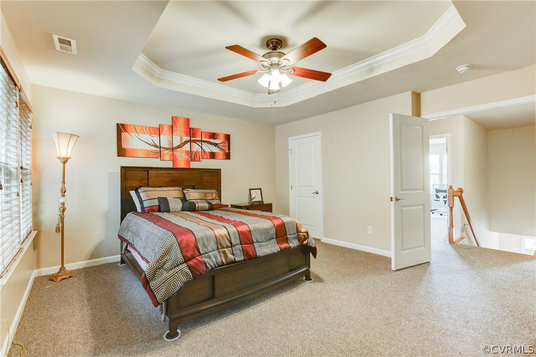 3602 Avocado Drive Midlothian, VA 23112 - Photo 29 of 39 a bedroom with a bed and a ceiling fan
