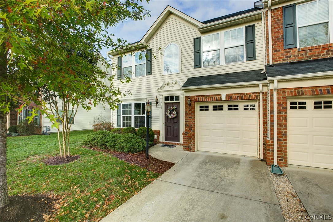 3602 Avocado Drive Midlothian, VA 23112 - Photo 3 of 39 a front view of a house with garden