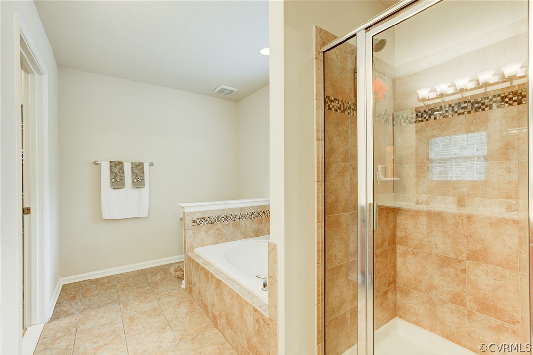 3602 Avocado Drive Midlothian, VA 23112 - Photo 33 of 39 a bathroom with a tub and a shower