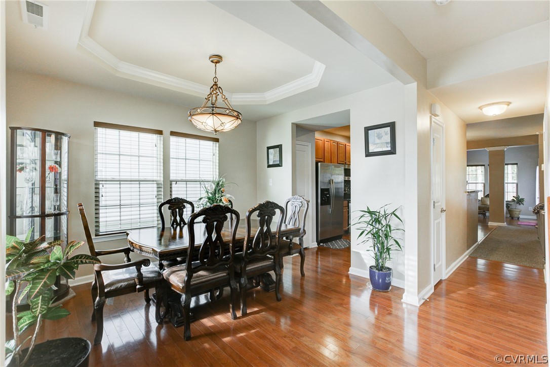 3602 Avocado Drive Midlothian, VA 23112 - Photo 6 of 39 a view of a a dining room with furniture window and wooden floor