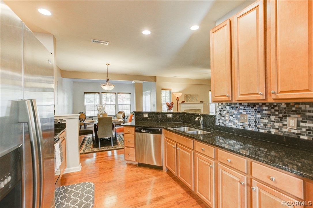 3602 Avocado Drive Midlothian, VA 23112 - Photo 9 of 39 a large kitchen with granite countertop a large counter top appliances and cabinets
