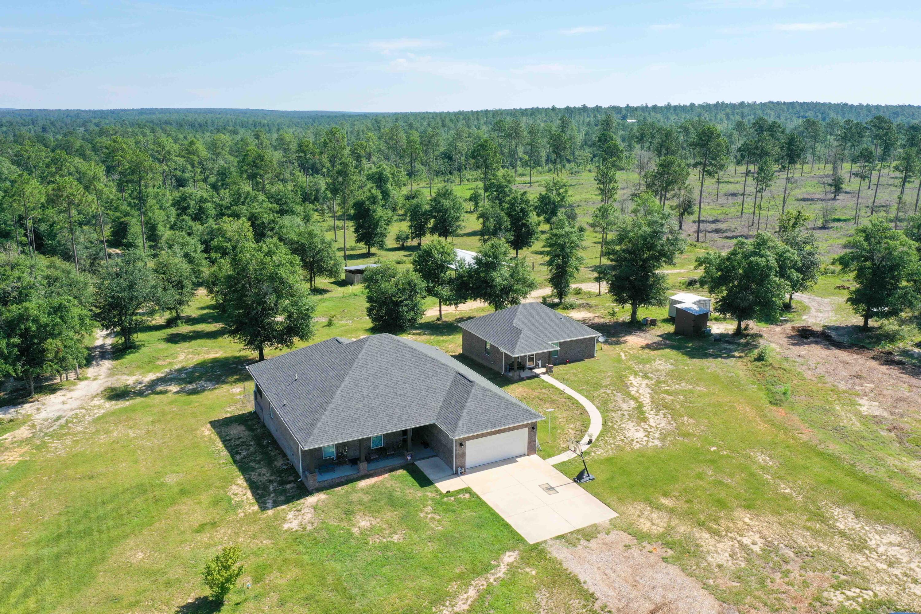a view of a swimming pool and lounge chairs
