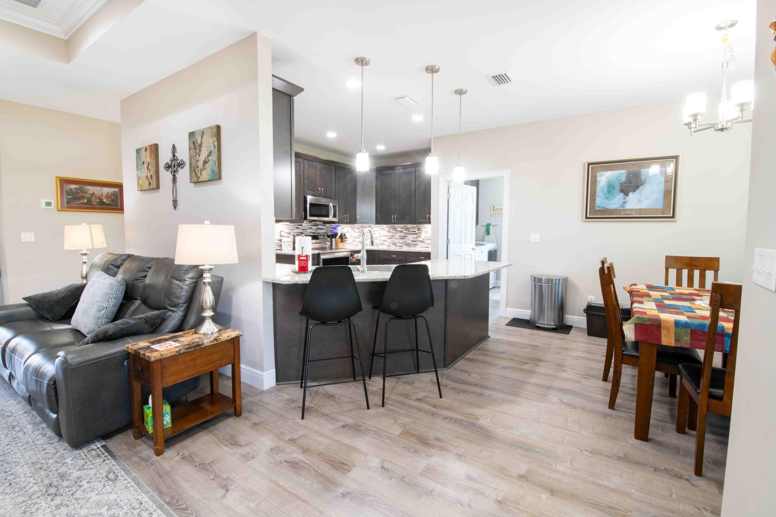 6249 Highway 4 Baker, FL 32531 - Photo 12 of 37 a living room with furniture and wooden floor