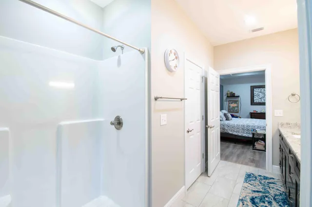 a view of a bedroom from a hallway