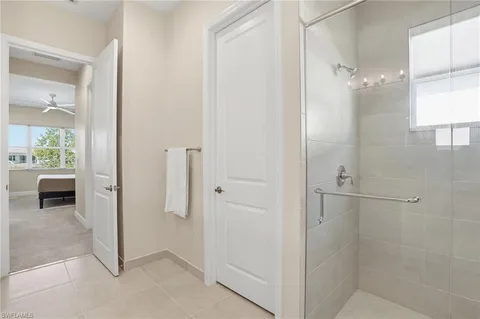 wooden floor in a bathroom with a shower