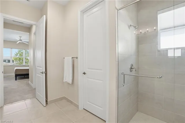 wooden floor in a bathroom with a shower
