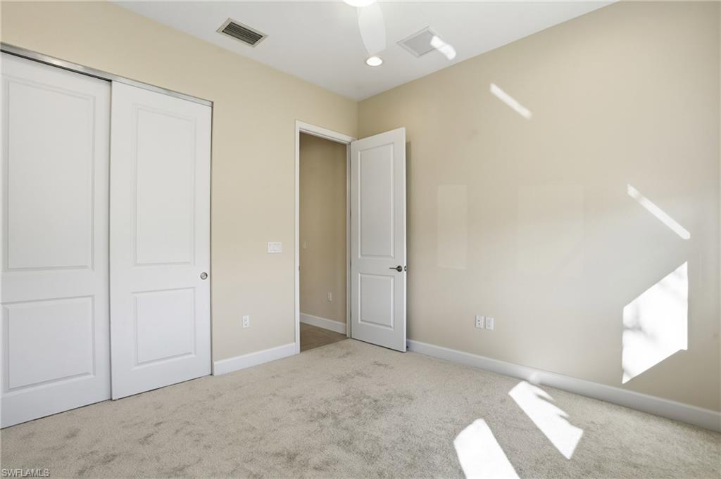 12391 Purple Ficus Way Naples, FL 34120 - Photo 24 of 44 Bedroom 2.This canvass is yours to paint.