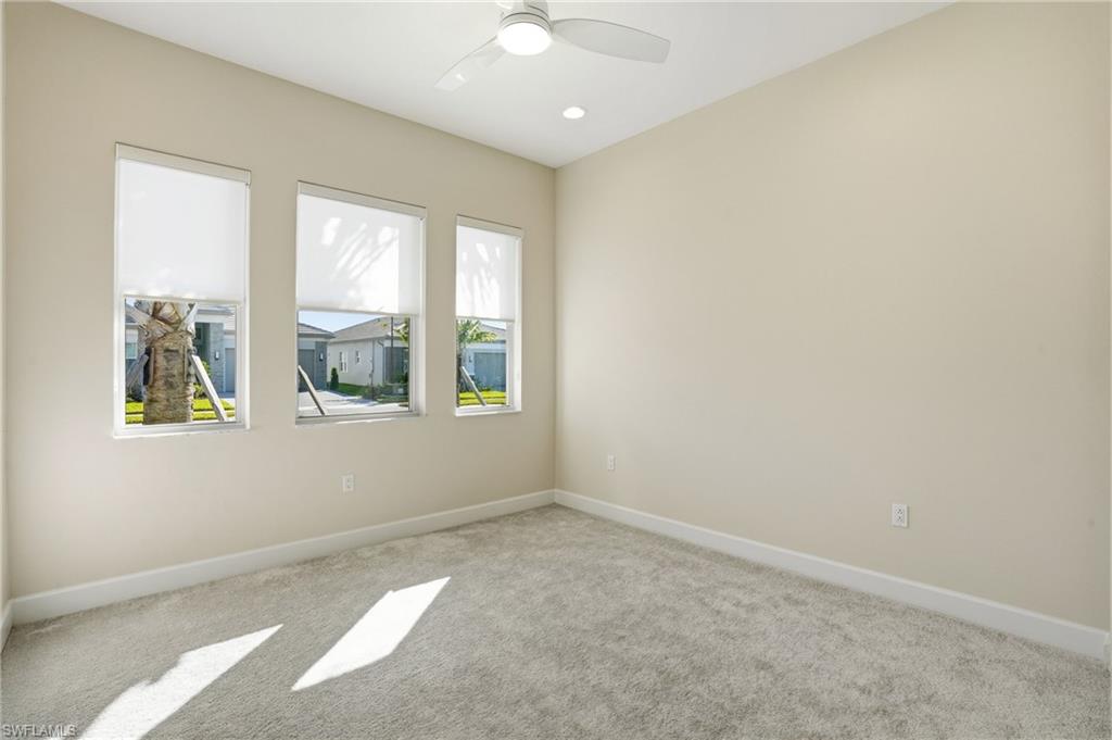 12391 Purple Ficus Way Naples, FL 34120 - Photo 25 of 44 Bedroom 2. Fills with wonderful natural light in the morning. Privacy blinds for the evening.