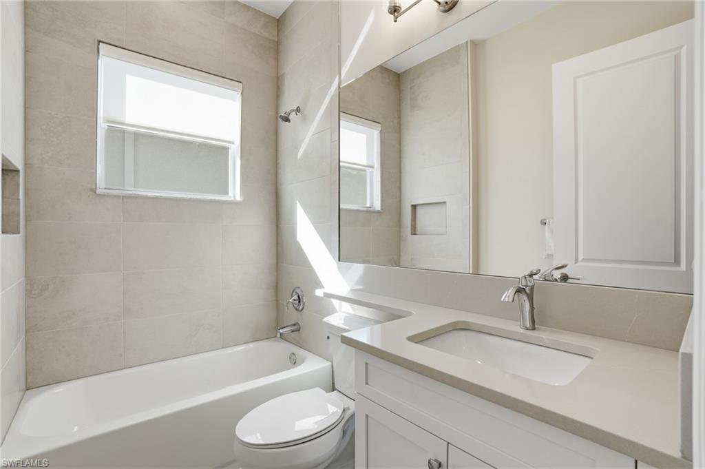 12391 Purple Ficus Way Naples, FL 34120 - Photo 26 of 44 Guest bath nicely appointment with quartz countertops