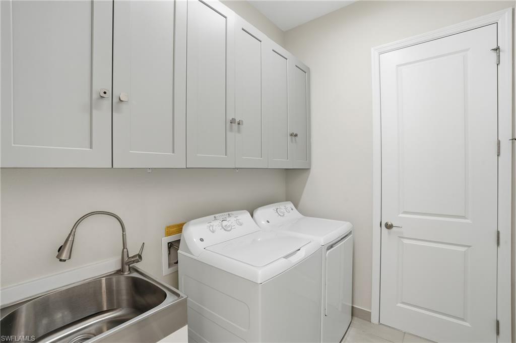 12391 Purple Ficus Way Naples, FL 34120 - Photo 27 of 44 Large laundry room with sink