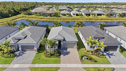 an aerial view of a house with a garden