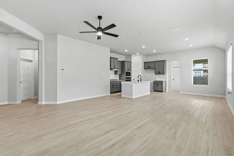 a view of a kitchen with a sink and cabinet area