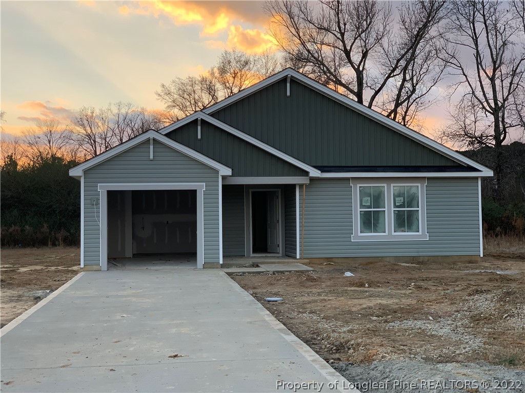 5938 Lowgrass Road Stedman, NC 28391 - Photo 1 of 1 a house with a outdoor space